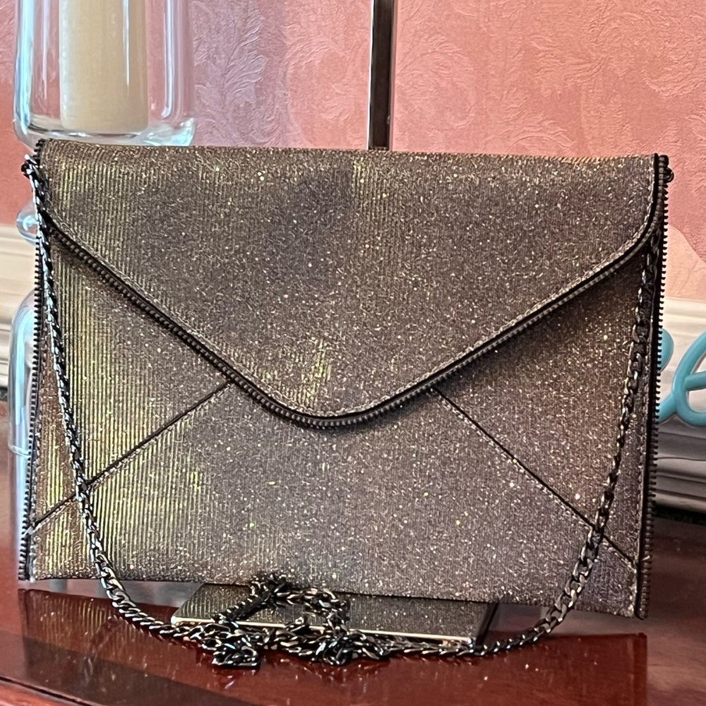 Zippered Edge Iridescent Envelope Clutch. Changes colors as you move.